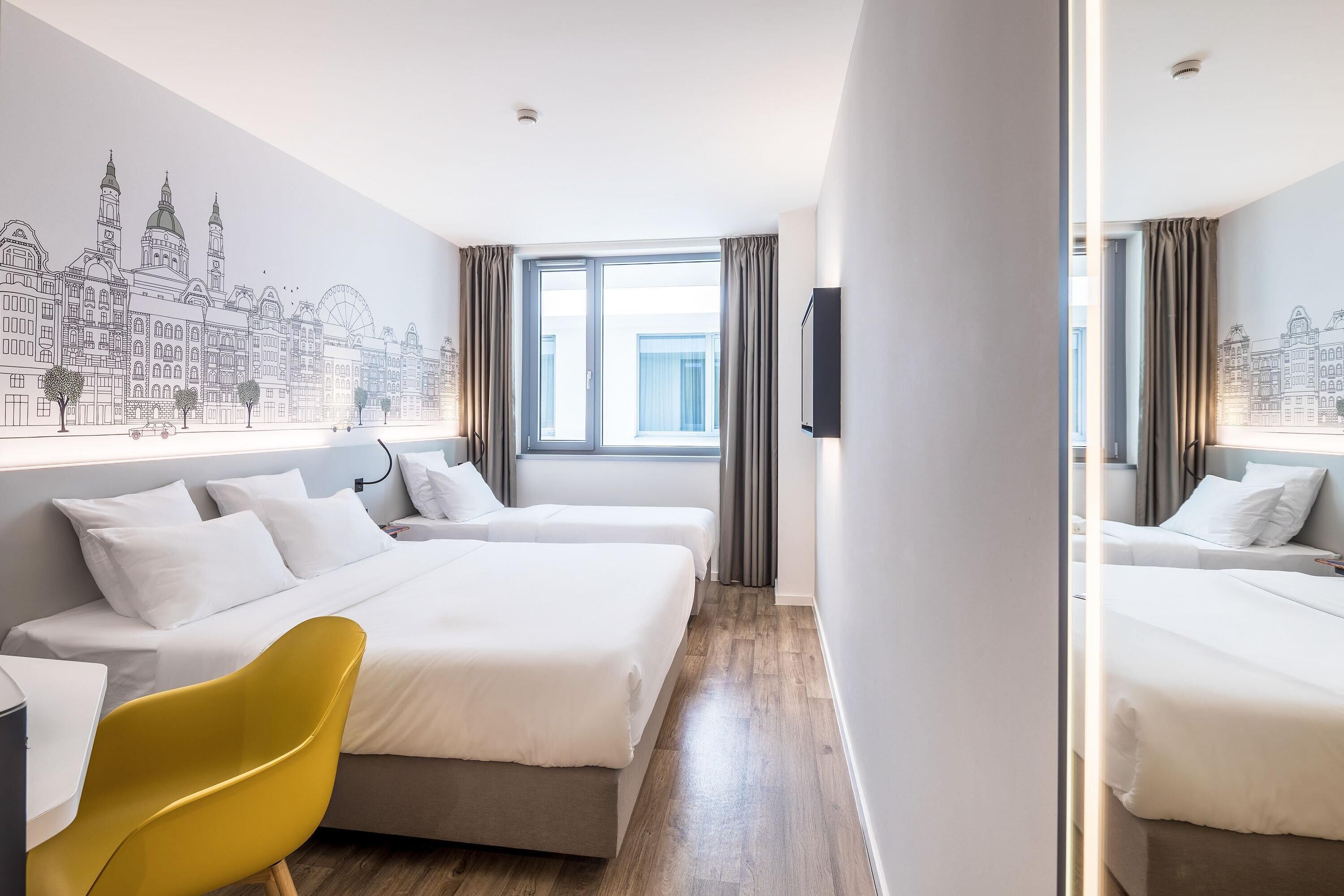 Tremannsrom – standard | Safe på rommet, skrivebord, lydisolert og wi-fi (inkludert)