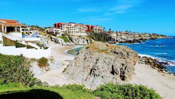 On the beach, sun-loungers, beach towels