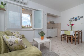 Flat-screen TV, table football