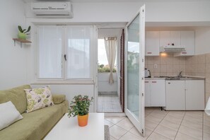 Flat-screen TV, table football