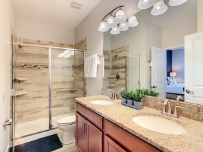 Combined shower/tub, hair dryer, towels, toilet paper