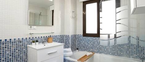 Hair dryer, towels, shampoo