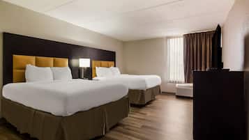 Suite, Multiple Beds, Non Smoking | Desk, laptop workspace, blackout drapes, iron/ironing board