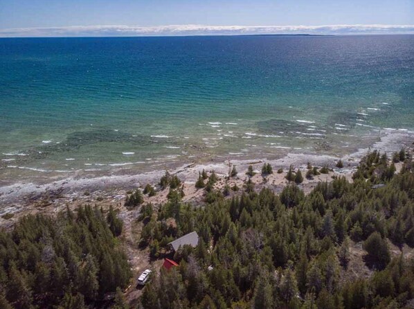 On the beach - Off Grid Experience on the most unique alvar rock beach on Manitoulin Island. (silver water)