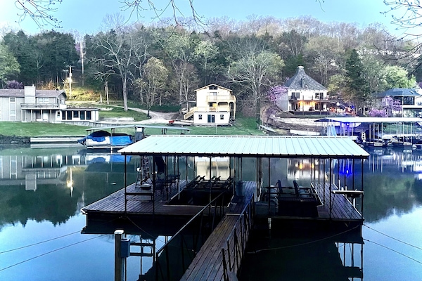 Private dock with one boat slip available for your boat + swimming and fishing