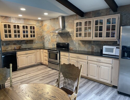 Lake of the Ozarks, “Vista Cove” Private Lake Front Home w/ 2 slip private dock