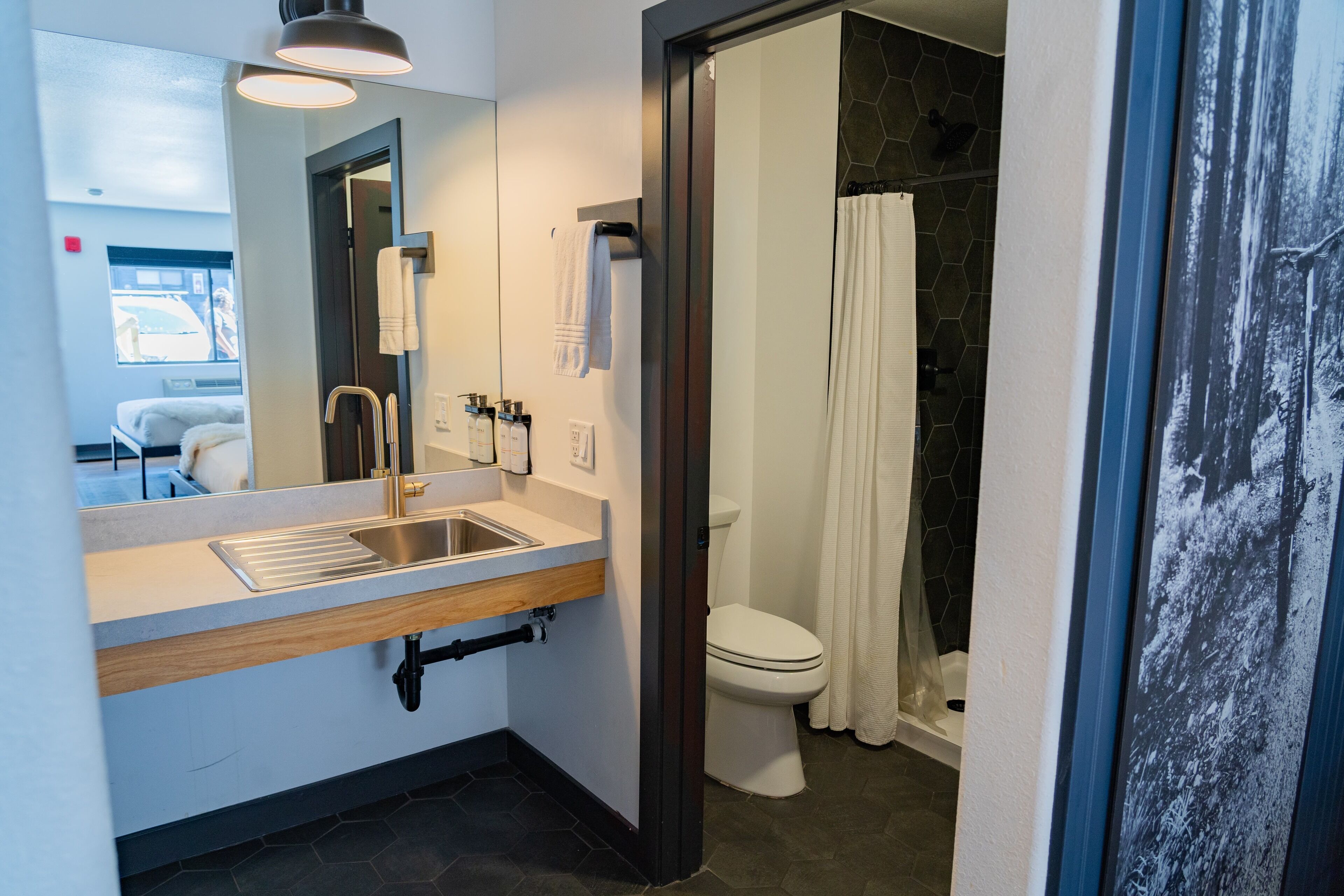 eco-friendly toiletries, hair dryer, bathrobes, slippers