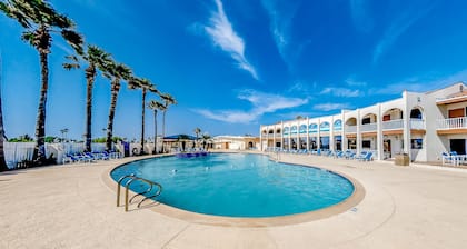 Gorgeous Intercoastal waterfront home on channel w/shared pool, hot tub, & dock