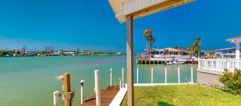 Gorgeous Intercoastal waterfront home on channel w/shared pool, hot tub, & dock