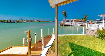 Gorgeous Intercoastal waterfront home on channel w/shared pool, hot tub, & dock