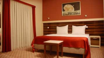 Family Room, Balcony, Courtyard View | Frette Italian sheets, premium bedding, minibar, in-room safe