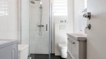 Apartment (Three Bedroom Apartment with Terrace) | Bathroom | Shower, hair dryer, soap, toilet paper