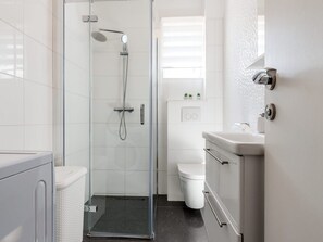 Apartment (Three Bedroom Apartment with Terrace) | Bathroom | Shower, hair dryer, soap, toilet paper