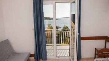 Apartment (Two Bedroom Apartment with Sea View A) | Living room | TV