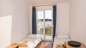 Apartment (Two Bedroom Apartment with Sea View A) | 9 bedrooms, free WiFi, bed sheets