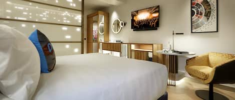 1 habitación, cubrecamas, minibar y caja de seguridad en la habitación