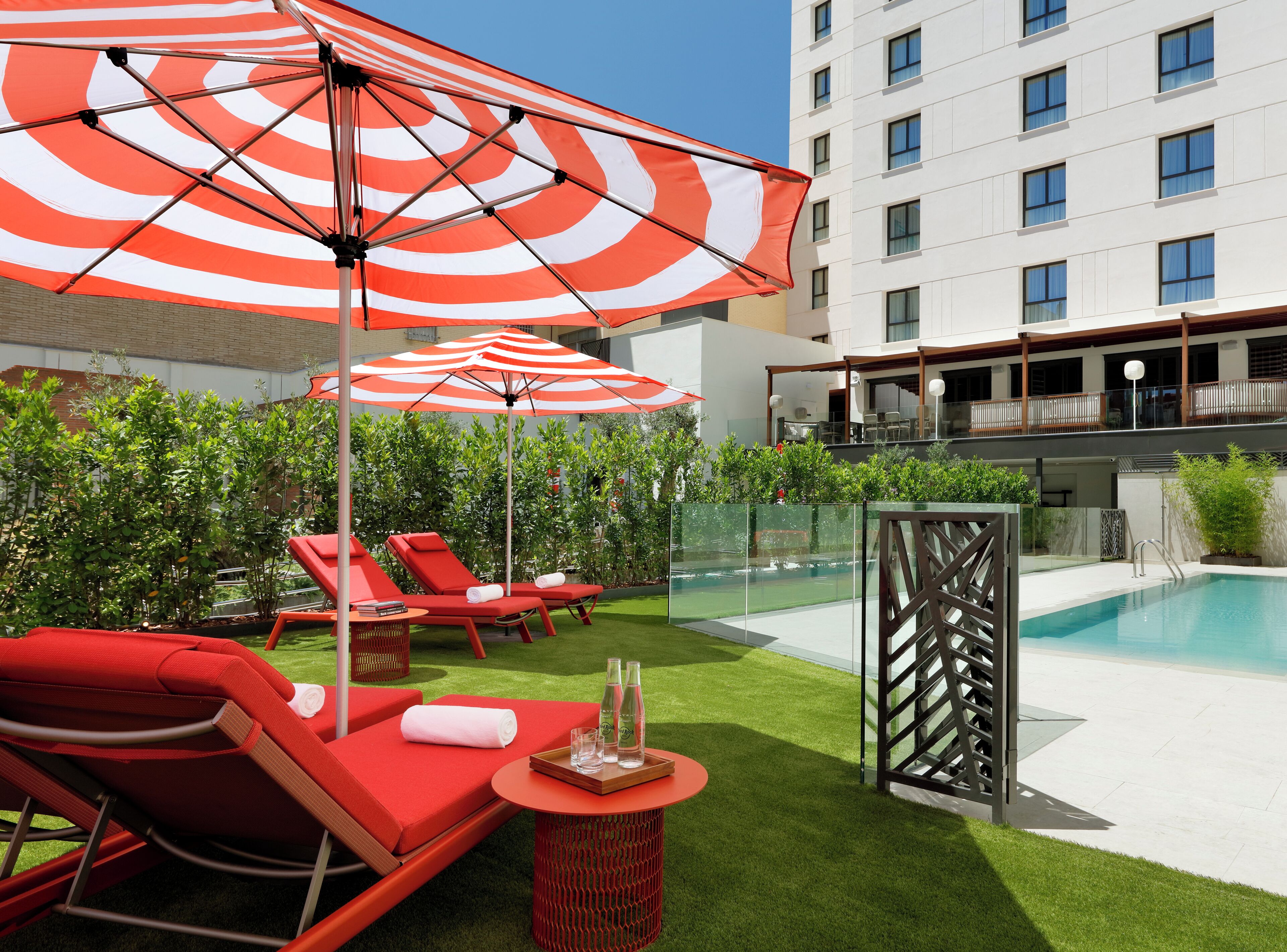 Seasonal outdoor pool, open 10:30 AM to 8:30 PM, pool umbrellas