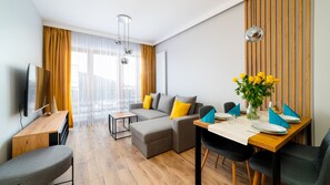 Appartement (11 E) | Aire de séjour | Téléviseur à écran plat