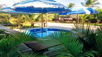 Outdoor pool, open 9:00 AM to 6:00 PM, pool umbrellas, sun loungers