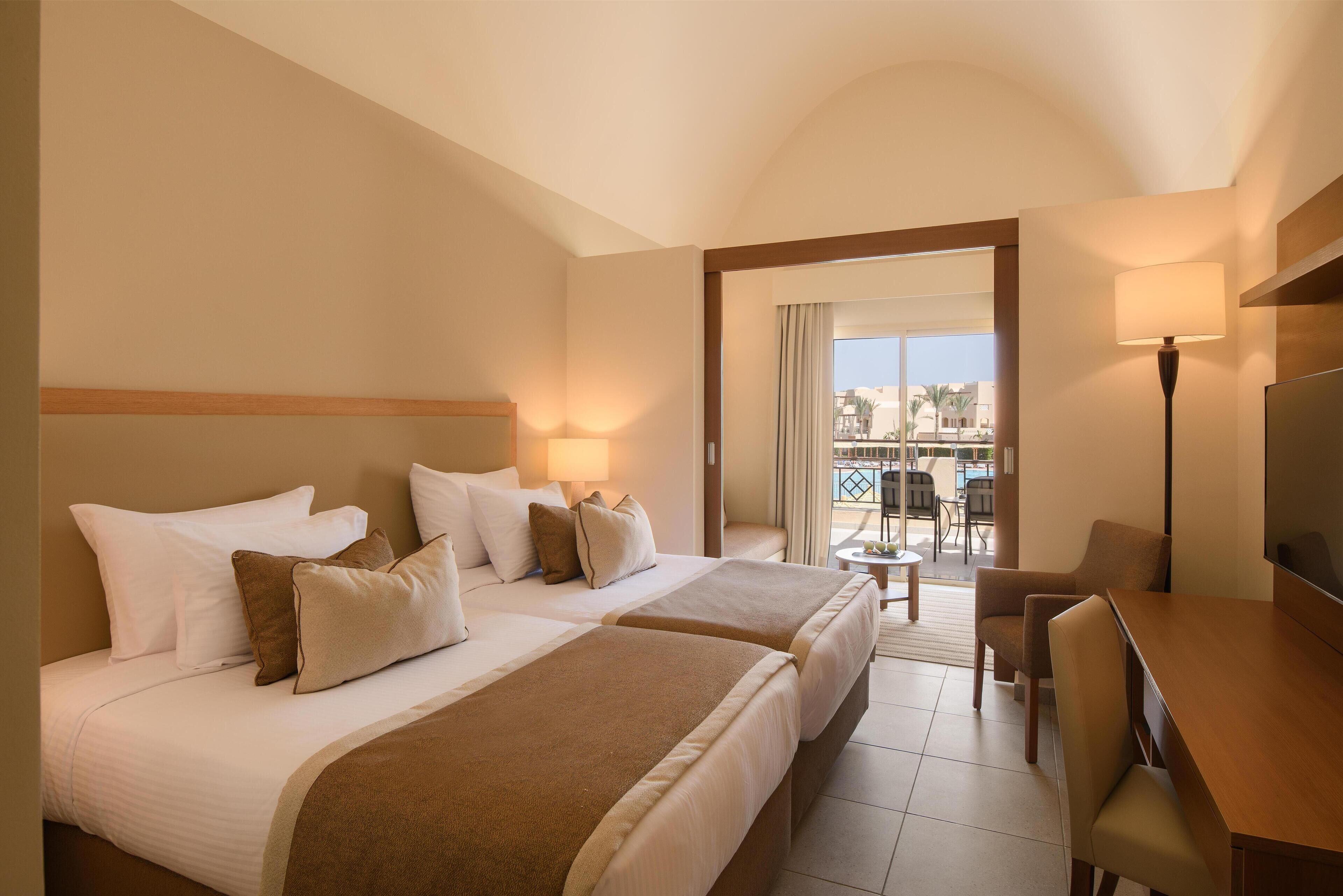 Family Deluxe Room Pool View (Queen or Twin) | Minibar, in-room safe, free cribs/infant beds, bed sheets