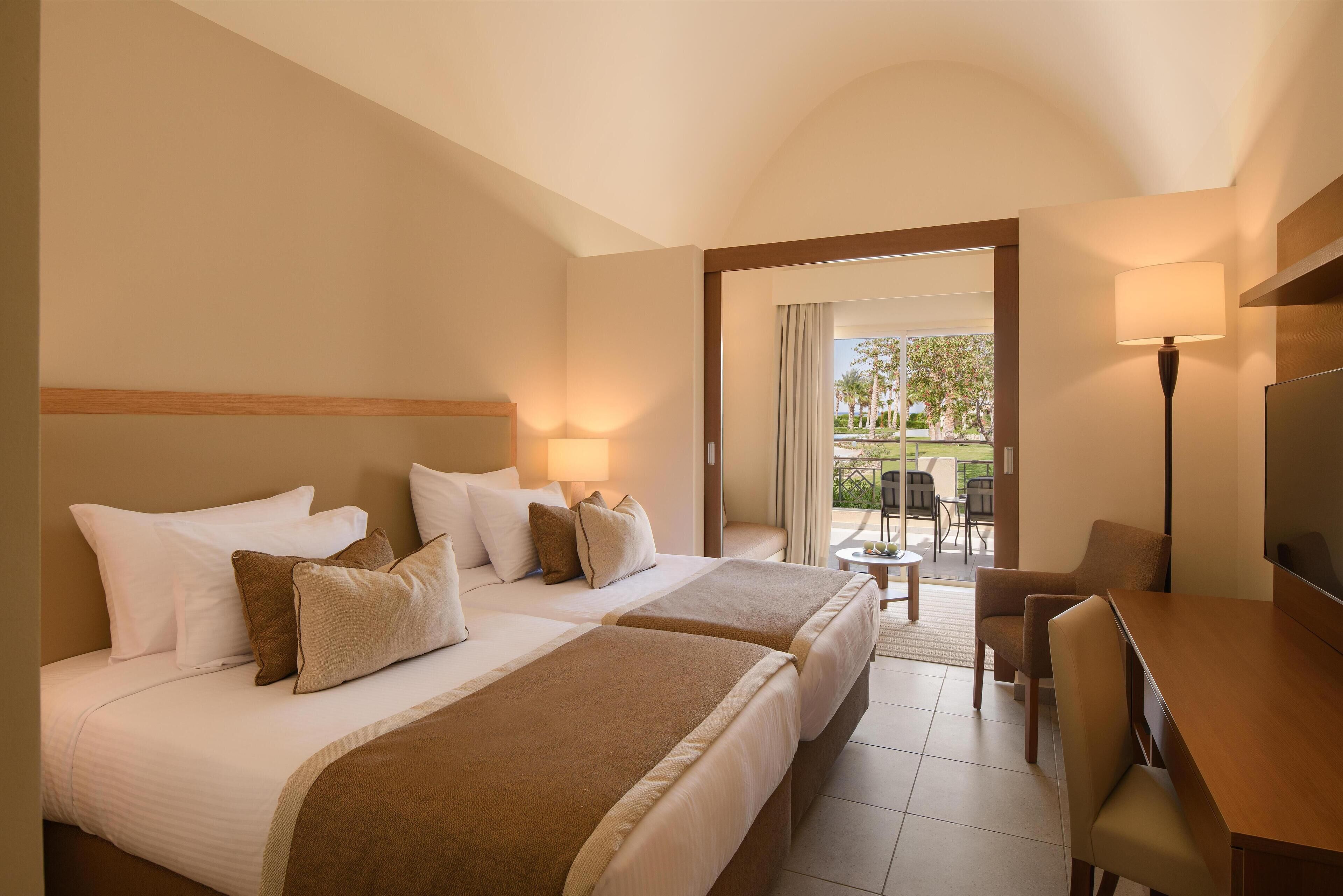 Family Deluxe Room Garden View (Queen or Twin) | Minibar, in-room safe, free cribs/infant beds, bed sheets