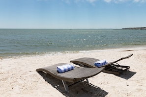 On the beach, sun loungers