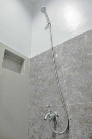Standard Double Room | Bathroom | Shower, rainfall showerhead, towels, toilet paper