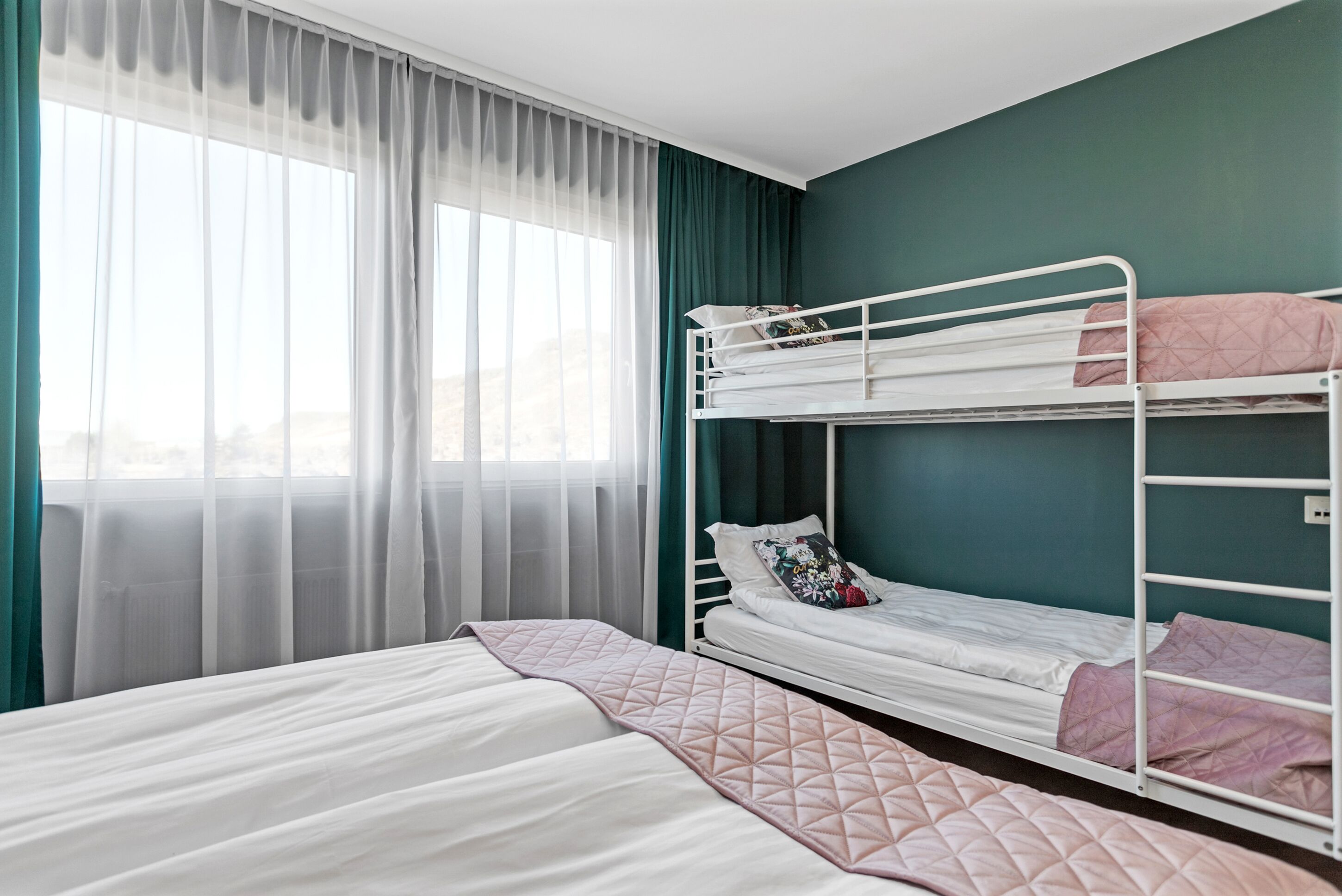 family room | blackout curtains, iron/ironing board, free cots/infant beds, free wifi