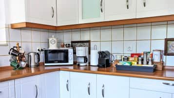 Villa | Private kitchen | Fridge, microwave, oven, stovetop