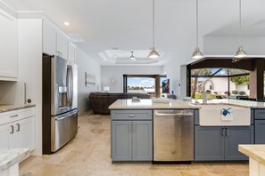 Fridge, microwave, oven, stovetop - Custom Heated Pool, Kayaks, Bikes, & Spectacular Views - Villa Lakeside Oasis - Roelens Vacations (Cape Coral)