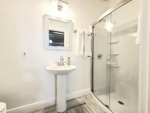 Hair dryer, towels, soap, shampoo