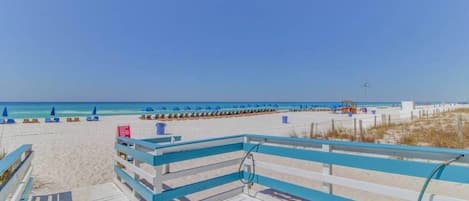 On the beach, sun loungers, beach towels