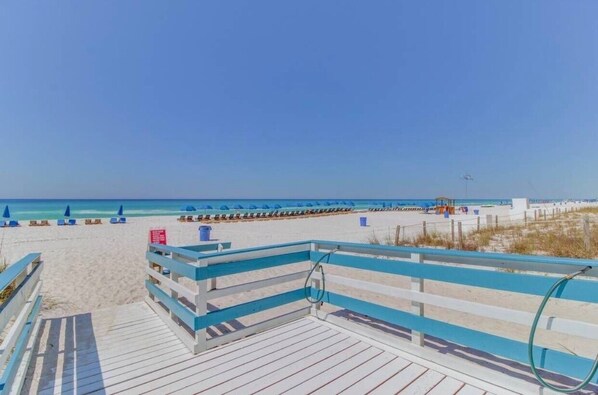 On the beach, sun loungers, beach towels