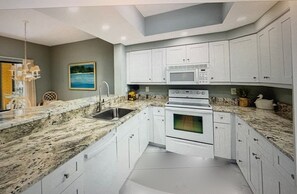 Fridge, microwave, oven, stovetop - Overlook Club Pelican Golf AND walk to beach -30 Day rental min for March 2025 (Naples)
