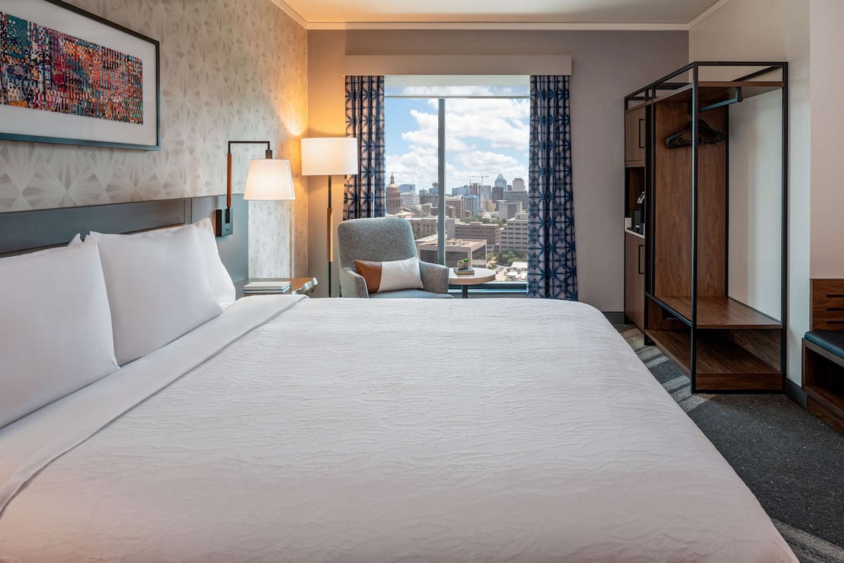Down duvets, pillow-top beds, in-room safe, desk