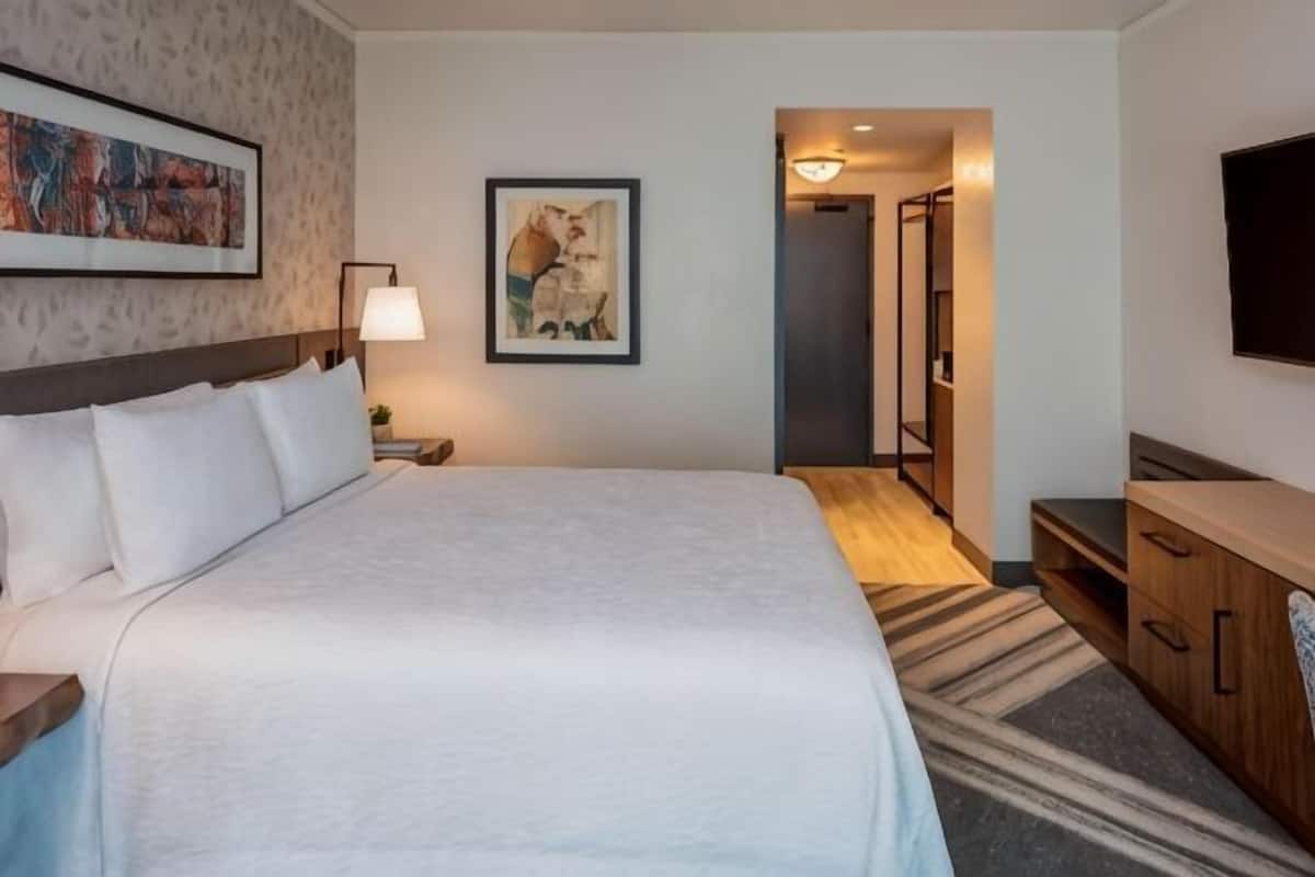 Down comforters, pillowtop beds, in-room safe, desk