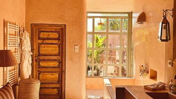 Superior Room | Bathroom | Shower, hair dryer, bathrobes, slippers