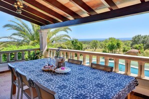 Outdoor dining - Finca Jeroni (Sleeps 8) Pool A/C Panoramic Views to the Sea on the Horizon (Felanitx)