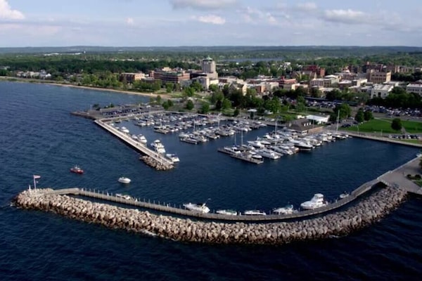 Scenic marina views w/ boats, breakwater & sparkling blue water