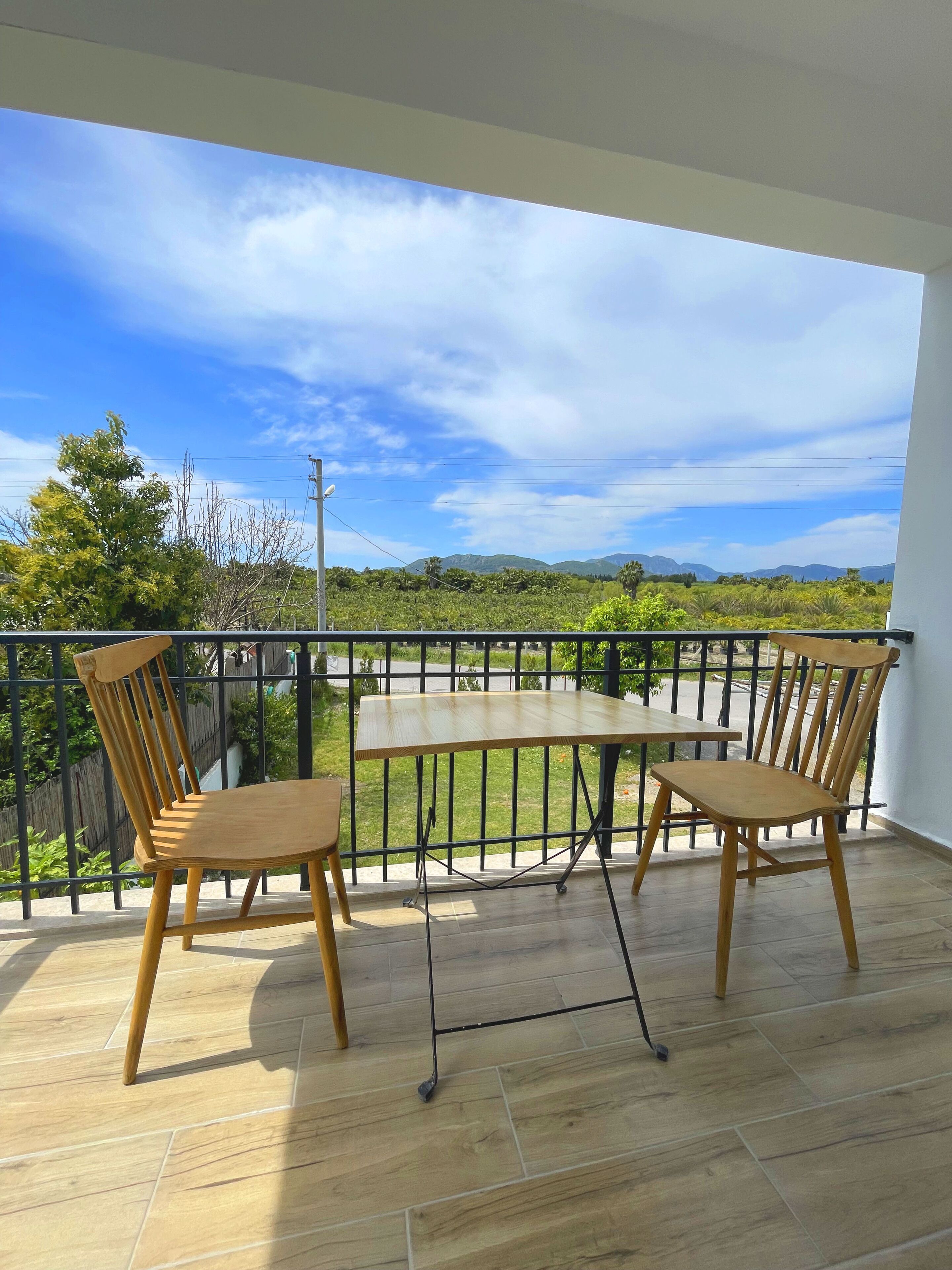 Standaard vierpersoonskamer | Uitzicht vanaf balkon