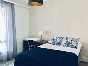 Condo urbano | 1 habitación, caja de seguridad en la habitación y cortinas blackout 