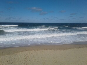 On the beach, sun loungers, beach towels