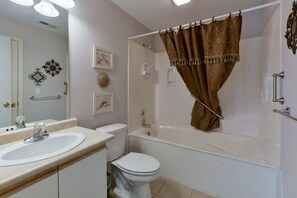 Shower, hair dryer, towels, shampoo