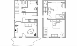 Un plan d’étage d’une chambre d’hôtel comprenant une salle de bain, un coin cuisine et un espace salon.