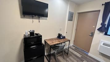 Deluxe Single Room (vinyl) | Premium bedding, down comforters, individually decorated