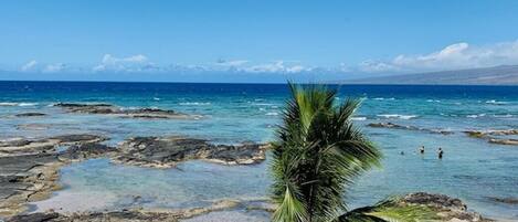 On the beach, sun loungers, beach towels