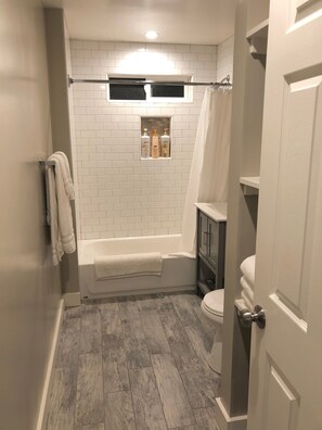 Combined shower/tub