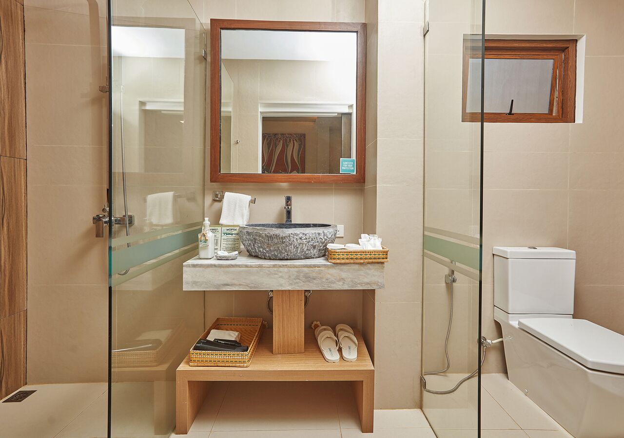 Shower, free toiletries, hair dryer, slippers