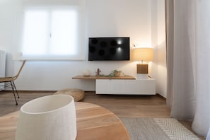 Superior Apartment | Living area | 43-inch Smart TV with cable channels, TV