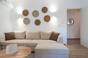 Apartamento superior | Sala de estar | Smart TV 43 polegadas com canais a cabo, TV